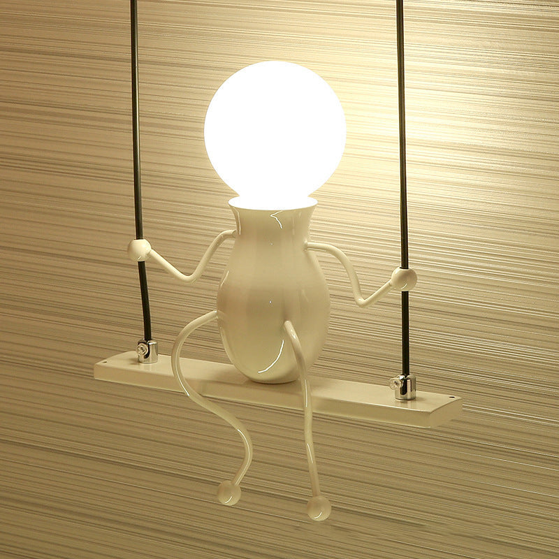 SwingMuse Wandleuchte mit schaukelnder Figur – Ansicht 11 von 13