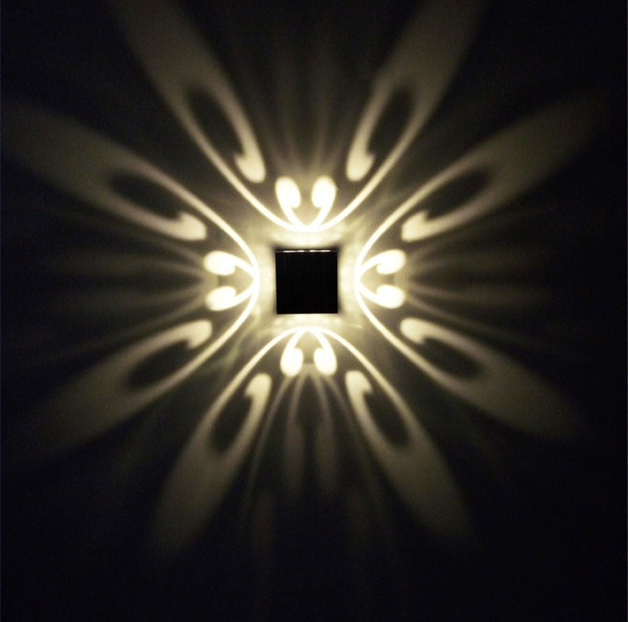 ColorBeam LED-Wandleuchte mit bunten Lichtprojektionen